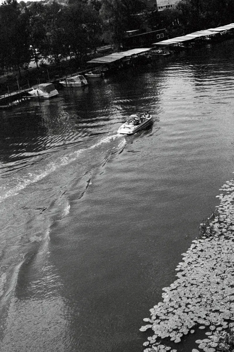 Boat cruising the river